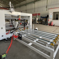 Machine à agrafer les cartons ondulés semi-automatique à deux pièces