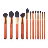 Pinceaux de maquillage en poils synthétiques avec logo personnalisé, OME, 12 pièces, manche en bois doré, logo personnalisé, faible MOQ, ensemble de pinceaux de maquillage de luxe dans un sac