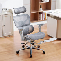 Nouveau fauteuil de bureau électrique massant ergonomique en maille avec appuie-tête 3D, accoudoirs 6D, repose-pieds rétractable, vérin à gaz et recharge USB