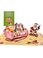 Cartes-cadeaux en stock un groupe de chiens mignons sur un canapé rose portant des chapeaux de père Noël Pile de cadeaux et de cartes de voeux pop-up 3D du père Noël