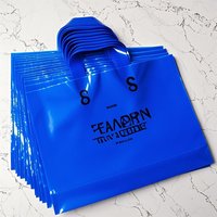 Vente en gros de sacs à provisions en plastique transparent avec poignées transparents et abordables pour les magasins