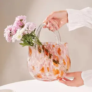แจกันแก้วสีชมพูสุดสร้างสรรค์ออกแบบได้ตามต้องการกระเป๋าถือแจกันแก้ว
