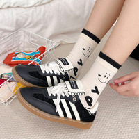 Nouvelles chaussettes en coton peigné, chien de dessin animé, chaussettes mi-mollet pour femmes, chaussettes tendance style scolaire pour femmes, chaussettes tendance