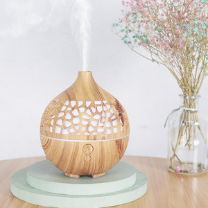 Difusor de aroma con diseño de madera, humidificador USB de 180 ml para uso en el hogar y la oficina con temporizador de 2 y 8 horas. - Product Image 5