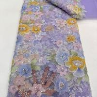 Tissu en dentelle brodée de fleurs perlées de 120 cm de large