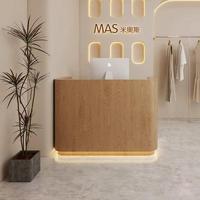 Bureau de réception ovale moderne en bois sur mesure avec éclairage LED pour logo, idéal pour salons de beauté, salons de coiffure et barbiers
