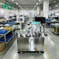 Machine de marquage laser à fibre avec alimentation automatique intégrée pour le traçage de pièces métalliques