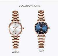 Montre à quartz pour femme élégante et luxueuse en or rose, incrustation de cristaux, bracelet en acier inoxydable, cadran avec date, fermoir papillon - Résistance à l'eau 30 m
