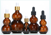 Bouteille en verre ambré en forme de gourde vide 10ml 20ml 30ml avec bouchon à vis pour les soins de la peau Offre Spéciale le récipient d'huile essentielle