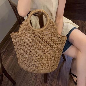 Luxe geometrische trekkoord-tas van stro voor dames - Boho geweven strandtas met uniek trekkoordontwerp, polyester voering, compact - Product Image 1