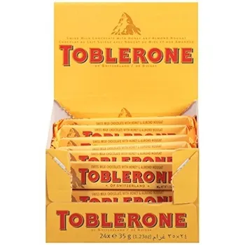 Швейцарский молочный шоколад Toblerone с медом и миндальной нугой