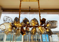 Grand lustre européen de luxe moderne Pendentif en cristal de verre de Murano doré pour hôtels Escaliers Soufflés en forme longue