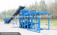 Brique de ciment solide en béton à plate-forme vibrante 2ton Petit bloc compressé QT4-26 faisant la machine/machine manuelle de fabrication de briques en Afrique