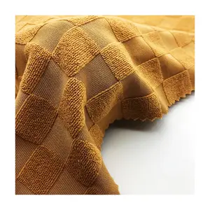 2023 Venda quente novo design quadriculado malha 100% poliéster sólida toalha jacquard terry biquíni tecido para maiô