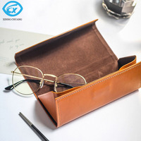 Offre Spéciale boîte d'emballage de lunettes avec logo personnalisé étui en cuir PU pliable à la mode pour lunettes de soleil étui organisateur pour lunettes et sacs