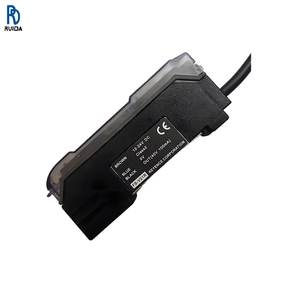 เครื่องขยายสัญญาณไฟเบอร์ออปติกแบบโฟโตอิเล็กทริก Keyence รุ่น FS2-60 ใช้ไฟ 12-24V DC กำลังไฟ 35mA สำหรับระบบอัตโนมัติในอุตสาหกรรม - Product Image 1