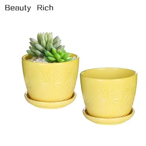 Set of 2 Yellow Sunburst Design Ceramic Flower Planter Pots/Decorative Plant Containers with Saucers
