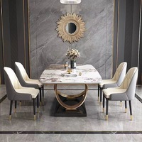 Ensemble table à manger extensible en métal de luxe léger de style italien moderne minimaliste à usage domestique appartements d'hôtel nouveau rectangulaire
