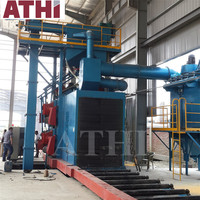 Machine de sablage de tuyaux à convoyeur à rouleaux électrique contrôlée par PLC, marque renommée ATHI Qingdao, avec boîte de vitesses pour nettoyage automatique de l'acier