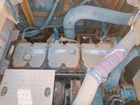 Excavatrice CAT 374 d'occasion, 74T, moteur haute puissance 359 kW, grande benne pour travaux de construction lourde