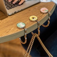Vente en gros en usine de crochet de table de sac à main pliant support de sac à main logo personnalisé cintre de sac