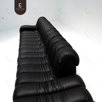 Sofá Seccional Modular Personalizable en Forma de Serpiente, Totalmente Negro, de Cuero Genuino, Patas de Acero Inoxidable, Diseño Moderno para Villas