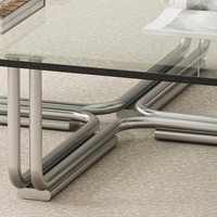 Table basse carrée avec plateau en verre trempé transparent, structure en acier inoxydable poli, design minimaliste moderne à profil bas pour
