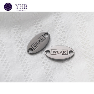 ปุ่มเย็บโลหะป้ายโลโก้อุปกรณ์เสริมสำหรับเสื้อผ้ามี2รูทรงวงรี - Product Image 1