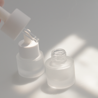 Flacon compte-gouttes rond en verre ambré personnalisé OEM en gros avec joint hermétique pour sérum cosmétique et huile essentielle 5ml 10ml 15ml en vrac