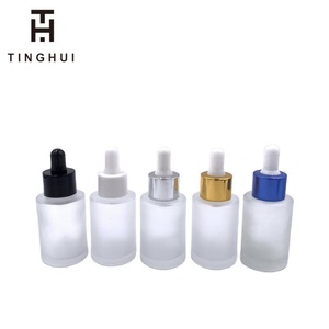 ขวดแก้วทรงกลมไหล่เรียบสีใสอำพันขุ่น ขนาด 30 มล. 1 ออนซ์ พร้อมหัวหยดสีขาวดำ สุดหรู - Product Image 1