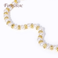 Perles d'écartement rondes en laiton plaqué or 18 carats de 3mm pour la fabrication de colliers et de bracelets.