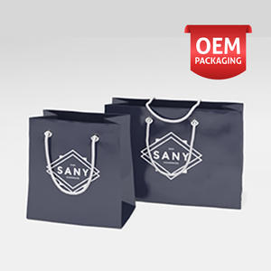 ถุงกระดาษธรรมดาที่มีที่จับกระเป๋าบรรจุภัณฑ์ถุงกระดาษลายนูนสำหรับใส่เสื้อผ้า - Product Image 2