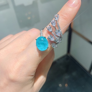 Bague de luxe pour femme en pierre bleue Paraiba, incrustée de <span class=keywords><strong>cuivre</strong></span> et de zircone cubique, avec motif multi-couches, coupe ovale, bijou de déclaration pour soirée - Product Image 6