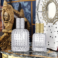 Bouteilles d'huile de parfum en verre transparent plat en forme d'ananas Offre Spéciale 30ml 50ml 100ml conception de grille de pulvérisateur de pompe de bouchon indépendant réutilisable