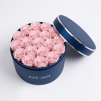 Boîte à fleurs ronde personnalisée de qualité supérieure, emballage en papier rond avec corps bleu marine, logo argenté pour cadeau floral de mariage