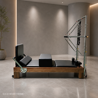 Reformer Pilates en bois de noyer avec demi-tournebroche, certifié CE, machine commerciale pour studio de Pilates de luxe