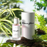 Bouteille de parfum de luxe à fond épais claire forme Unique 30ml 50ml 100ml bouteille de parfum en verre pour l'air de pulvérisation de presse portable pour hommes