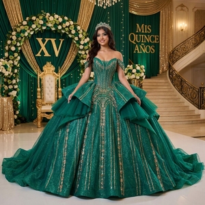 ชุดราตรีสีเขียวมรกตสำหรับงาน Quinceanera รุ่น Rsm261094 ทรงคอร์เซ็ทประดับด้วยลายปักสีทอง กระโปรงทรง Pannier พร้อมชายกระโปรงสั้น เหมาะสำหรับงานปาร์ตี้ ดีไซน์ Sweetheart - Product Image 1