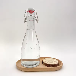Vente en gros de bouteilles de bière en verre hermétiques de 350ml 500ml en forme de cône Kombucha en verre avec bouchons à tête pivotante - Product Image 4