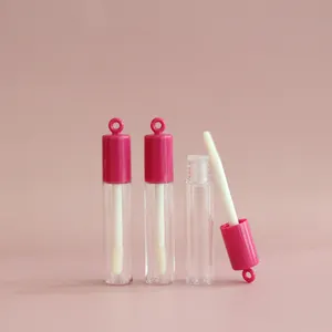 定制标志空粉红色唇光管，带圆形钥匙扣唇彩容器，带化妆品管用魔杖