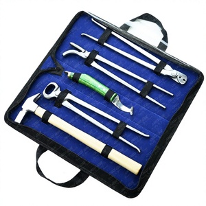 Ensemble de 5 outils professionnels pour le soin des sabots de cheval : Pince à sabots, Extracteur de clous, Cloueur, Couteau à sabots, Marteau à fer à cheval - Product Image 1