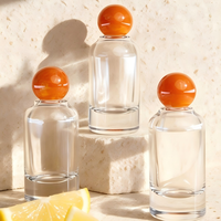 Ensemble de flacons de parfum en verre de 50 ml et 100 ml, vaporisateur, bouchon sphérique, pompe, logo personnalisé, flacon de parfum de luxe, impression à l'écran
