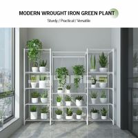 Étagère à plantes en métal robuste avec plusieurs niveaux de rayonnages en fil métallique et barre de suspension pour fleurs en pot, organisation de jardin d'intérieur