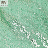 Tissu tricoté extensible dans les quatre sens Nanyee Textile, personnalisé, entièrement recouvert de paillettes vert jade clair