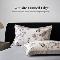 Parure de lit 4 pièces en fibre de polyester 100 % lavée effet soie, motif floral papillon, avec bordure large contrastante, housse de couette et draps en satin romantique