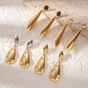 ต่างหูสแตนเลสสำหรับสุภาพสตรีต่างหูหินรูปวงรีสีทองหรูหราสำหรับ Diwali และกลับไปโรงเรียน - Product Image 1