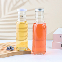Bouteilles en verre rondes avec bouchon à vis personnalisé, logo sur mesure, vente en gros, 5 oz, 12 oz, 500 ml, avec couvercle noir pour les boissons