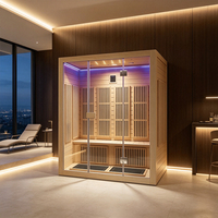 Salle de sauna infrarouge lointain avec structure en bois de pruche et cabine en verre, sauna intérieur personnalisé pour hôtel, spa et centre de bien-être