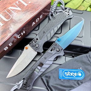 Cuchillo BM18060 con mango de fibra de nylon y hoja de material Magnacut, ideal para camping al aire libre y fines EDC. - Product Image 1