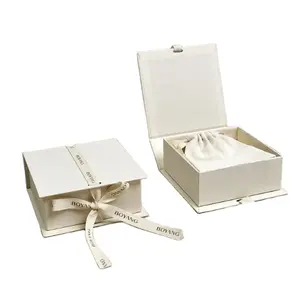 صندوق هدايا من الورق المقوى مغناطيسي مخصص أسود من مادة eva على شكل كتاب لتغليف المجوهرات مزود بيد مسك